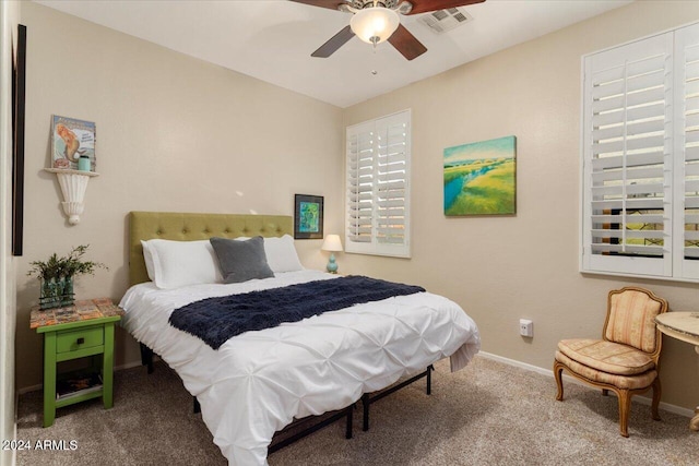 carpeted bedroom with ceiling fan