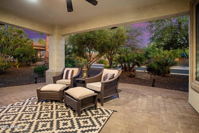 patio terrace at dusk with ceiling fan