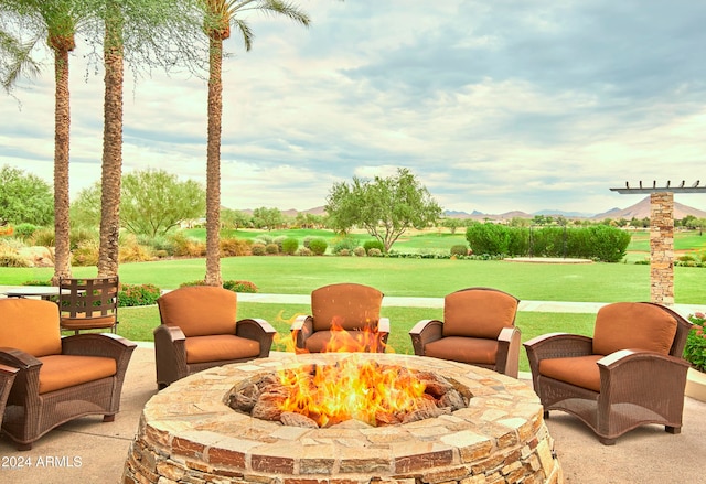 view of patio / terrace featuring a fire pit