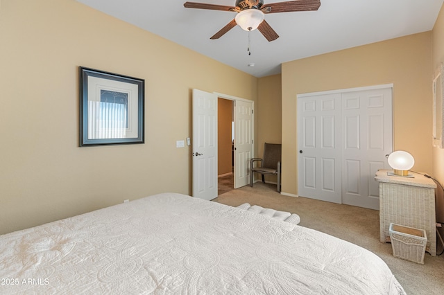 44574 W High Desert Trl, Maricopa, AZ 85139 - bedroom with carpet flooring, a ceiling fan, and a closet