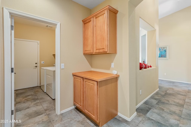44574 W High Desert Trl, Maricopa, AZ 85139 - washroom featuring laundry area, washer and clothes dryer, baseboards, and visible vents