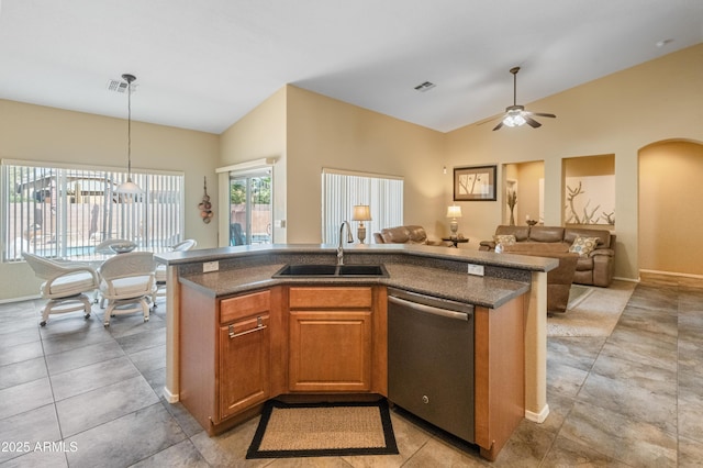 44574 W High Desert Trl, Maricopa, AZ 85139 - kitchen with a sink, dark countertops, dishwasher, and open floor plan