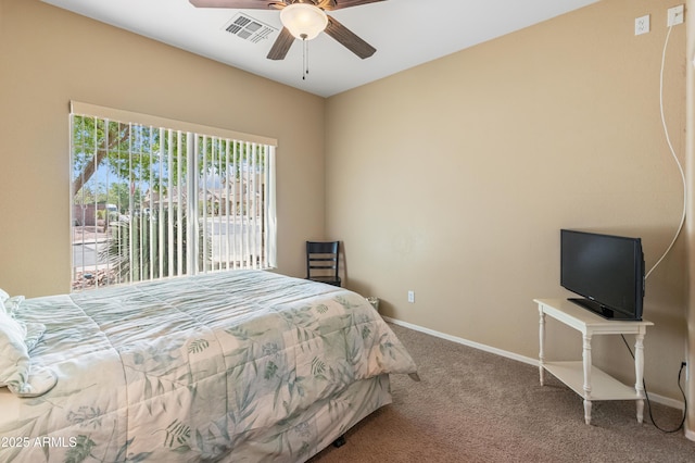 44574 W High Desert Trl, Maricopa, AZ 85139 - carpeted bedroom featuring visible vents, baseboards, and ceiling fan