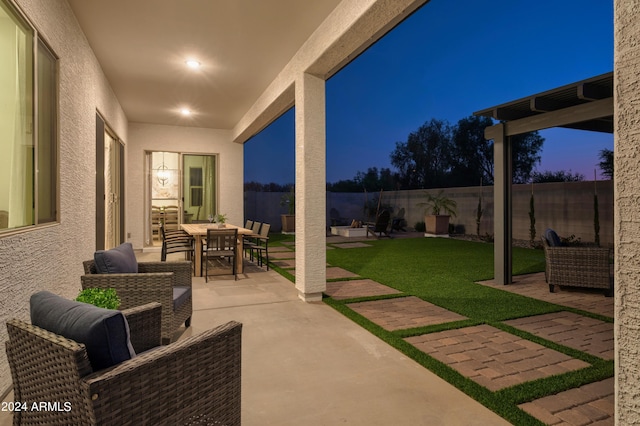 view of patio featuring outdoor dining space and a fenced backyard