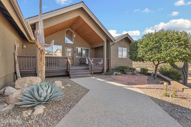 exterior space featuring a patio area and a deck