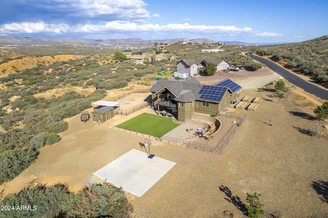 drone / aerial view featuring a mountain view