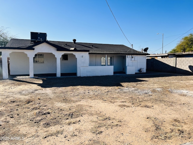 view of front of home with central air condition unit