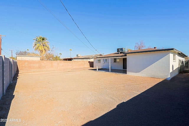 back of house with a patio area