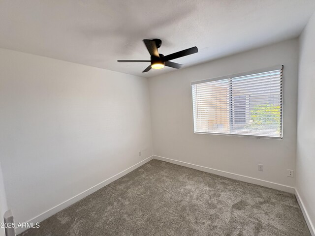 6419 W Monte Cristo Ave, Glendale, AZ 85306 - spare room with ceiling fan, baseboards, and carpet
