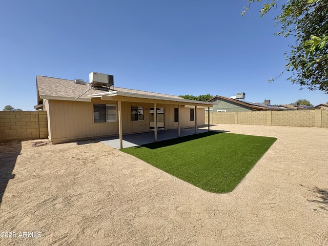 6419 W Monte Cristo Ave, Glendale, AZ 85306 - rear view of property featuring central air condition unit and a patio