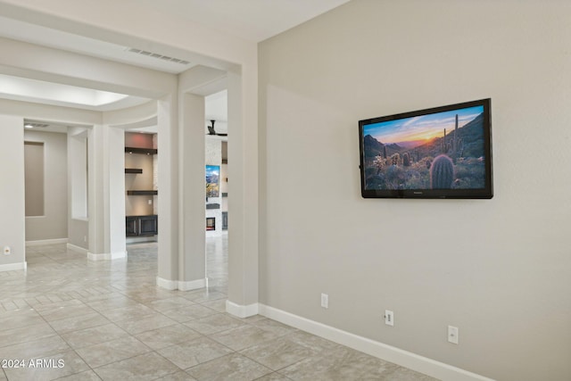 12860 W Calle De Sol, Peoria, AZ 85383 - spare room with baseboards and light tile patterned floors