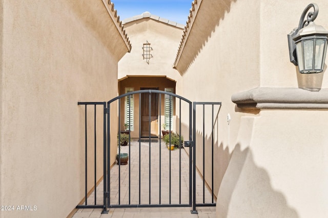 12860 W Calle De Sol, Peoria, AZ 85383 - property entrance featuring stucco siding and a gate