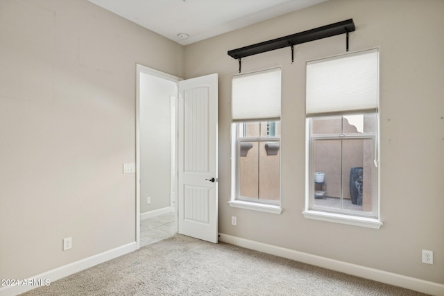 12860 W Calle De Sol, Peoria, AZ 85383 - carpeted spare room featuring baseboards and a smoke detector