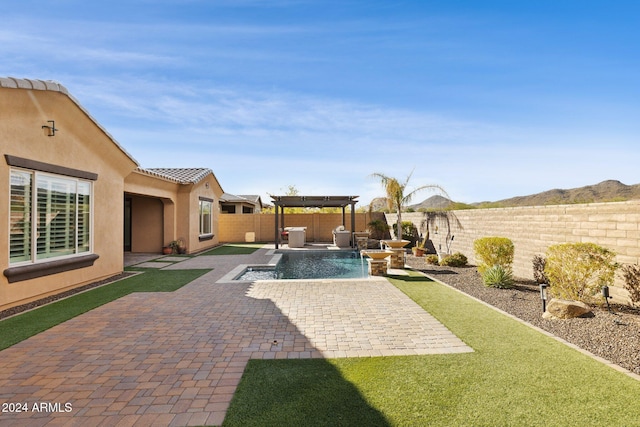 exterior space featuring pool water feature, a fenced in pool, and a pergola