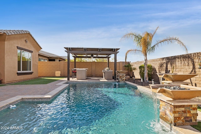 view of swimming pool featuring pool water feature and a patio area