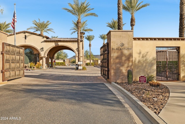 12860 W Calle De Sol, Peoria, AZ 85383 - view of street featuring a gate and a gated entry