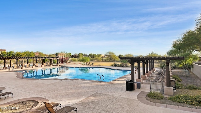 view of swimming pool featuring a patio