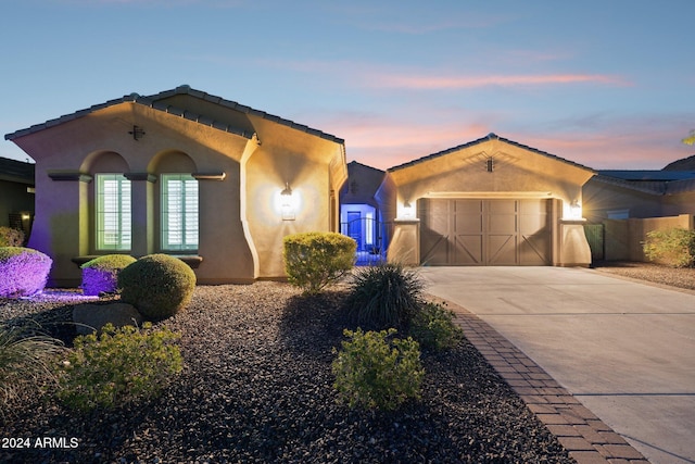 view of front of property featuring a garage