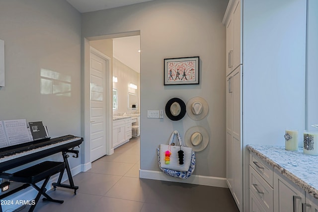 misc room with light tile patterned flooring