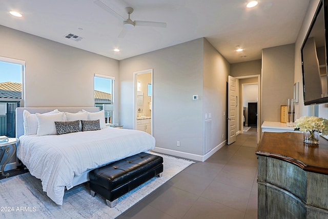 bedroom featuring ceiling fan, tile patterned flooring, and ensuite bathroom