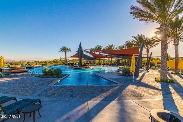 view of pool featuring a patio