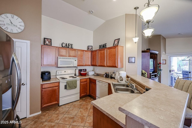 kitchen featuring sink, light tile patterned floors, kitchen peninsula, pendant lighting, and white appliances