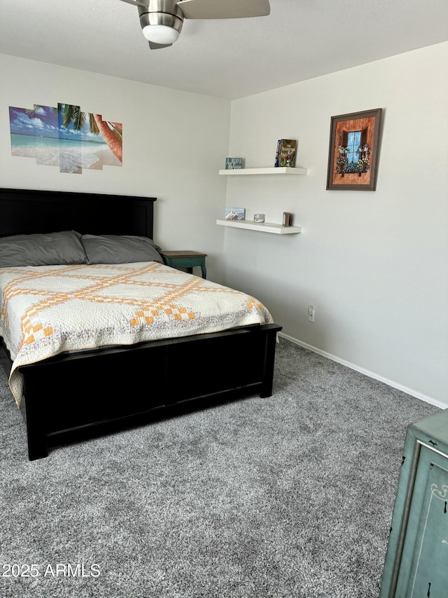 bedroom with carpet floors and baseboards