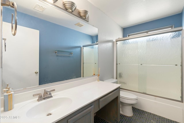 full bath featuring tile patterned floors, vanity, visible vents, and toilet