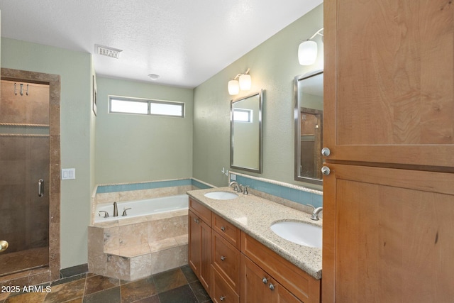 full bath featuring a sink, visible vents, a bath, and a stall shower
