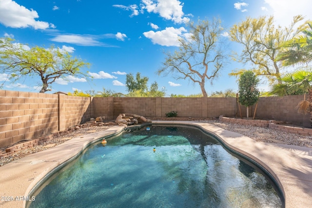 view of pool featuring a fenced backyard and a fenced in pool