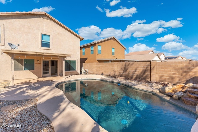 view of pool with a fenced backyard, a fenced in pool, and a patio