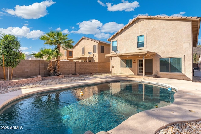 view of swimming pool with a patio, a fenced backyard, and a fenced in pool