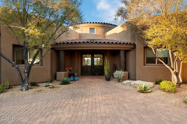 view of exterior entry with french doors