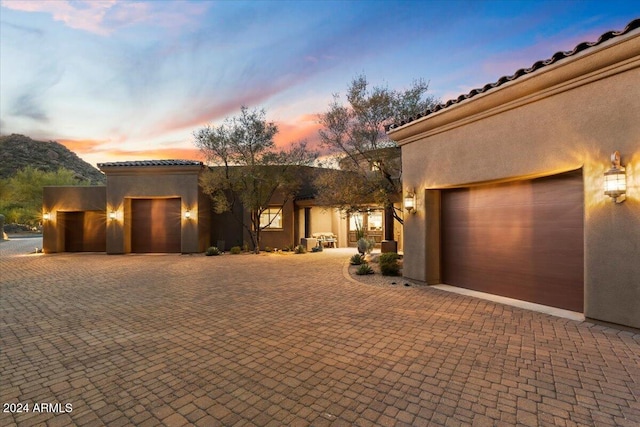 view of front of property with a garage