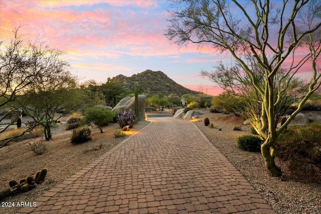 surrounding community with a mountain view