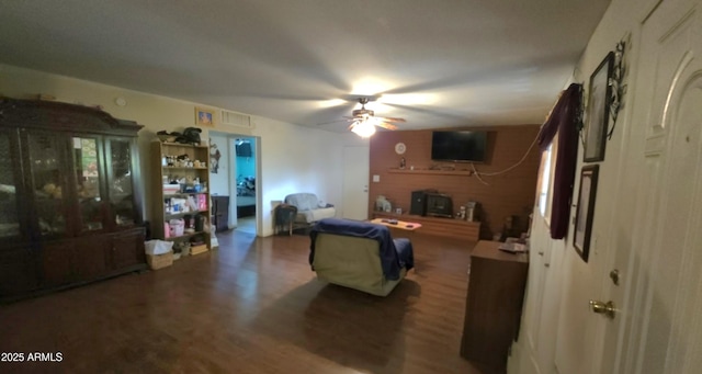 417 N 38th Ave, Phoenix, AZ 85009 - living area featuring a ceiling fan and wood finished floors
