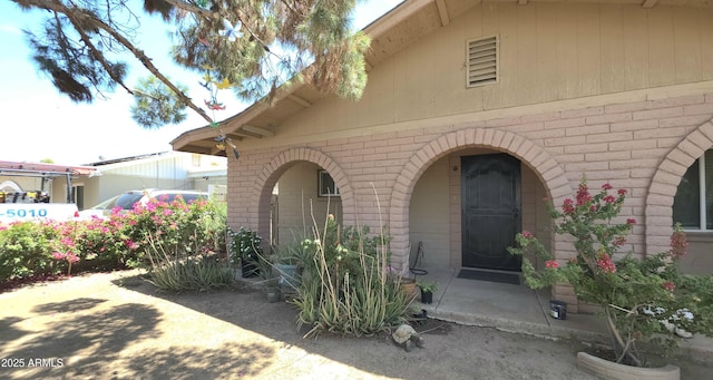 417 N 38th Ave, Phoenix, AZ 85009 - view of exterior entry featuring brick siding