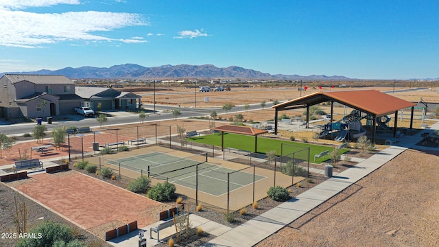 birds eye view of property with a mountain view