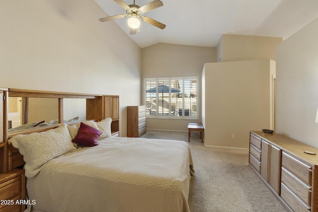 carpeted bedroom featuring lofted ceiling and ceiling fan