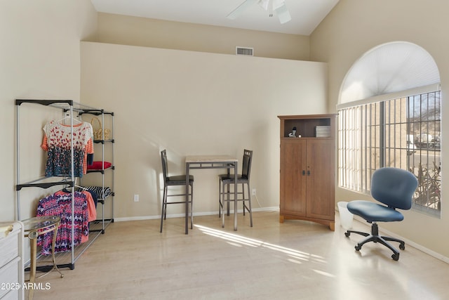 office space with ceiling fan