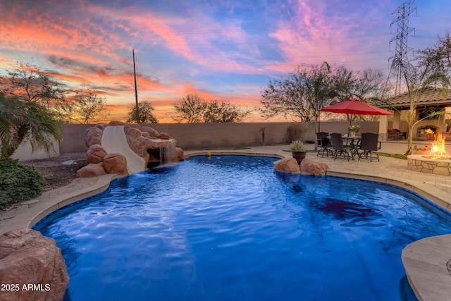 view of swimming pool with a fenced in pool, a patio area, and a fenced backyard