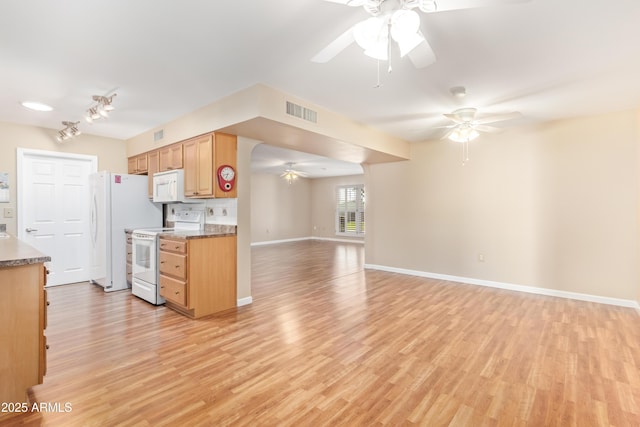 kitchen with ceiling fan, white appliances, and light hardwood / wood-style flooring