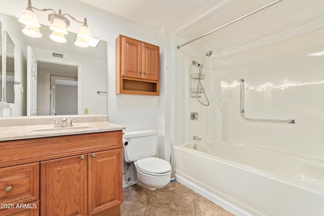 full bathroom featuring tile patterned floors, vanity, toilet, and shower / washtub combination