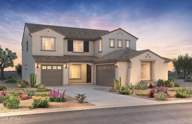7131 W Oberlin Way, Peoria, AZ 85383 - mediterranean / spanish-style house featuring an attached garage, driveway, a tiled roof, and stucco siding