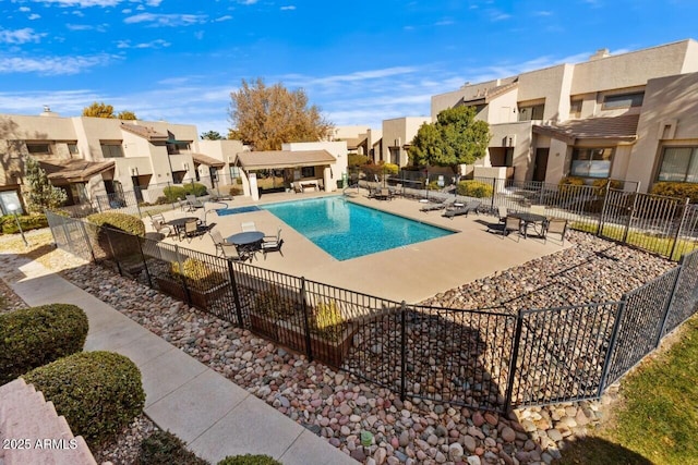 view of pool featuring a patio