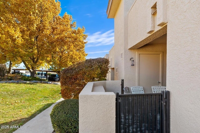 view of home's exterior featuring a lawn