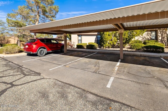 view of parking with a carport