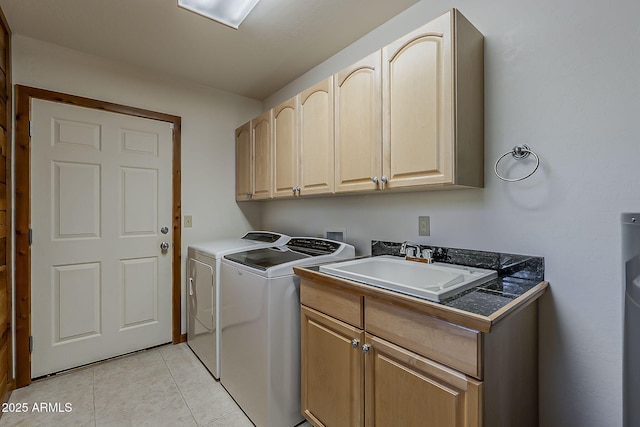 2793 Canyon Ridge Rd, Overgaard, AZ 85933 - laundry area with washing machine and clothes dryer, cabinet space, a sink, and light tile patterned floors