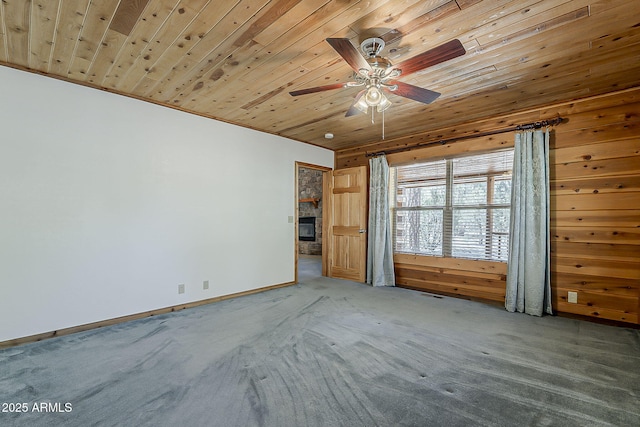 2793 Canyon Ridge Rd, Overgaard, AZ 85933 - carpeted spare room with wooden ceiling, baseboards, and a ceiling fan