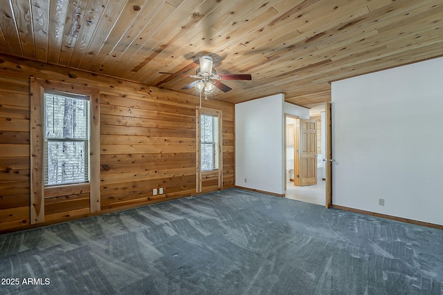 2793 Canyon Ridge Rd, Overgaard, AZ 85933 - carpeted empty room featuring wooden walls, baseboards, a ceiling fan, and wooden ceiling